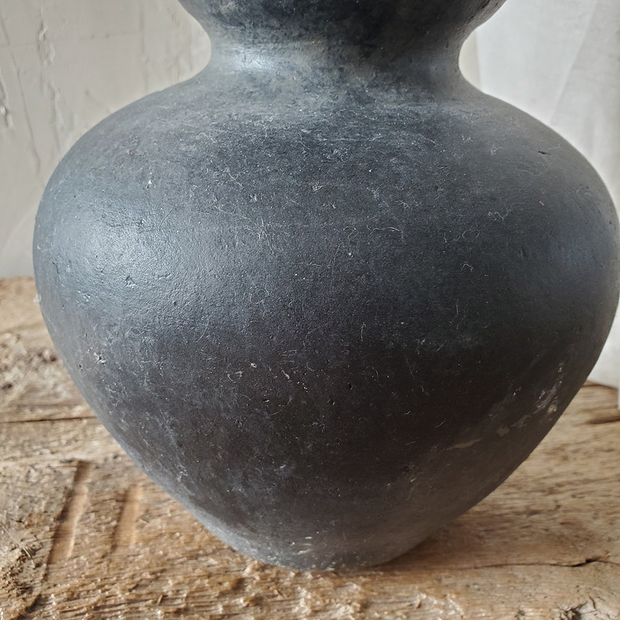 Small black vase