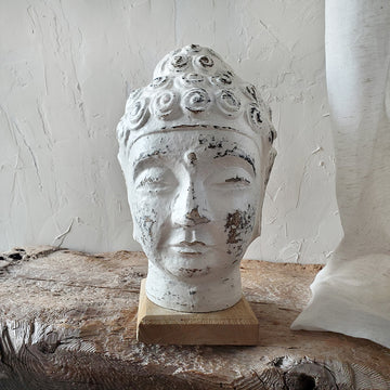 Wooden buddha head
