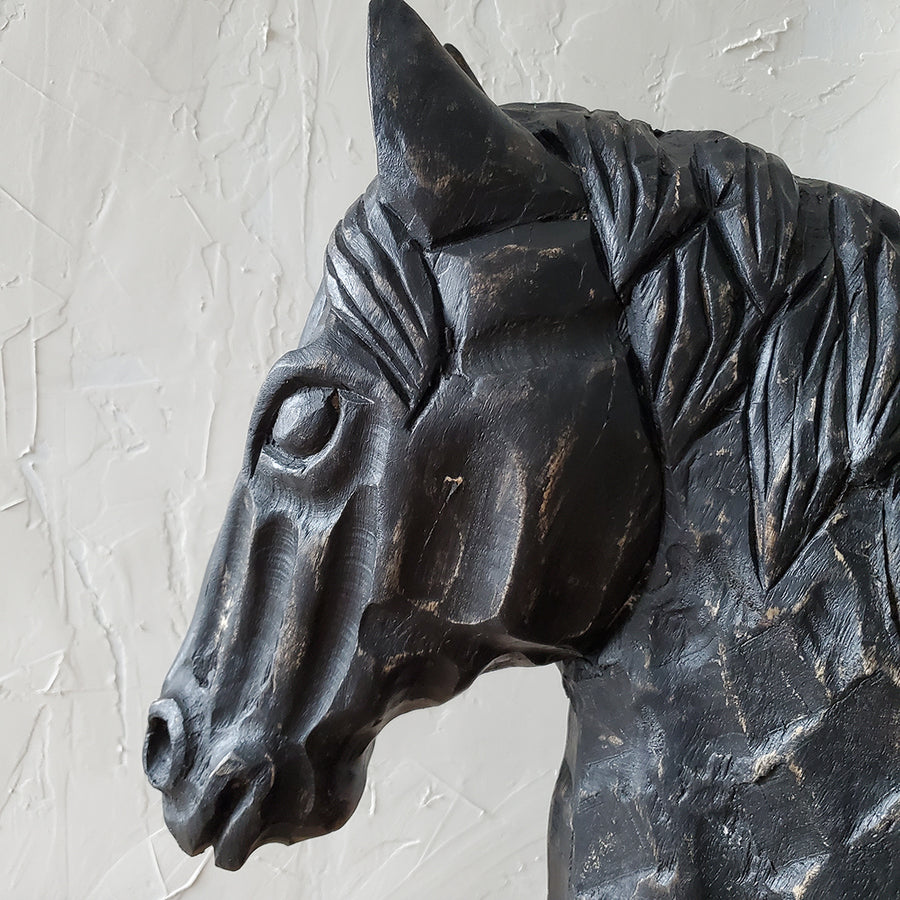 Large massive wooden horse head statue