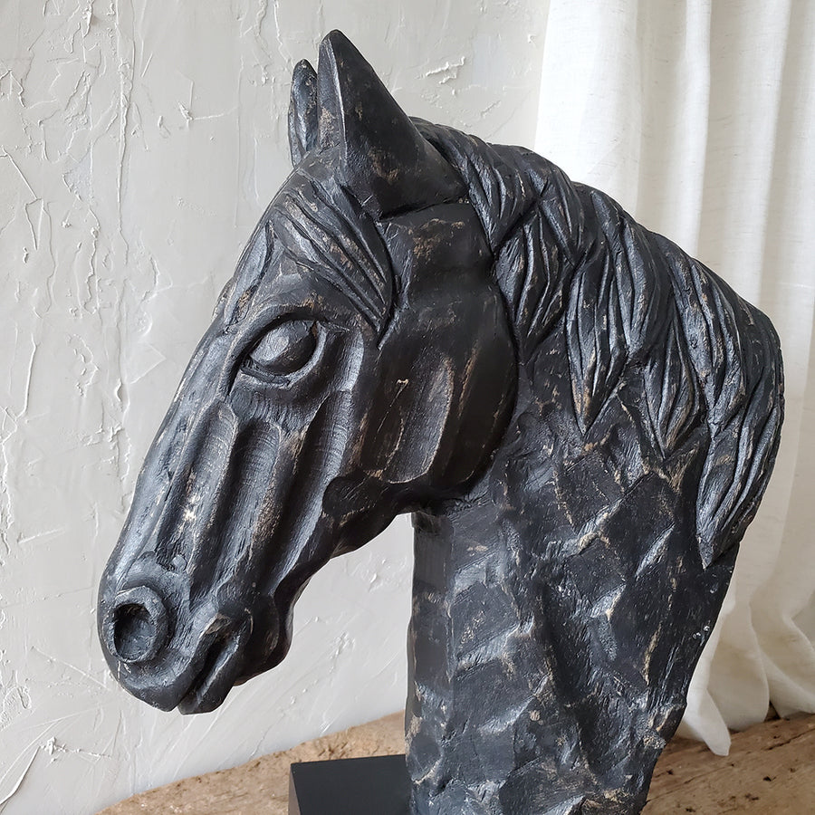 Large massive wooden horse head statue