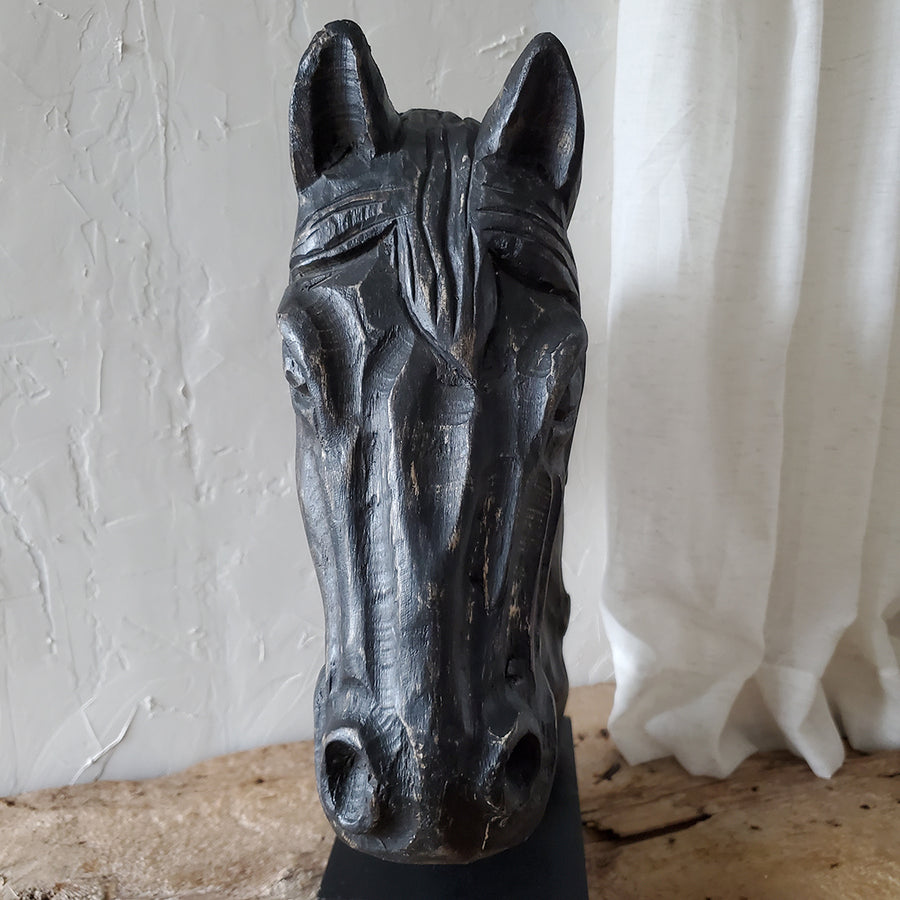 Large massive wooden horse head statue