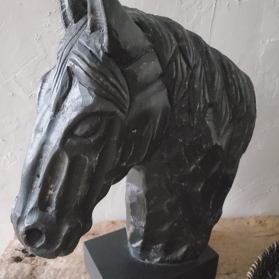 Large massive wooden horse head statue