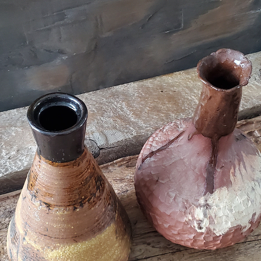 Set of 2 vintage pottery vases with garlands